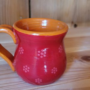 Kleine Tasse im Pop-Art-Look, rot-orange mit pinken Blümchen